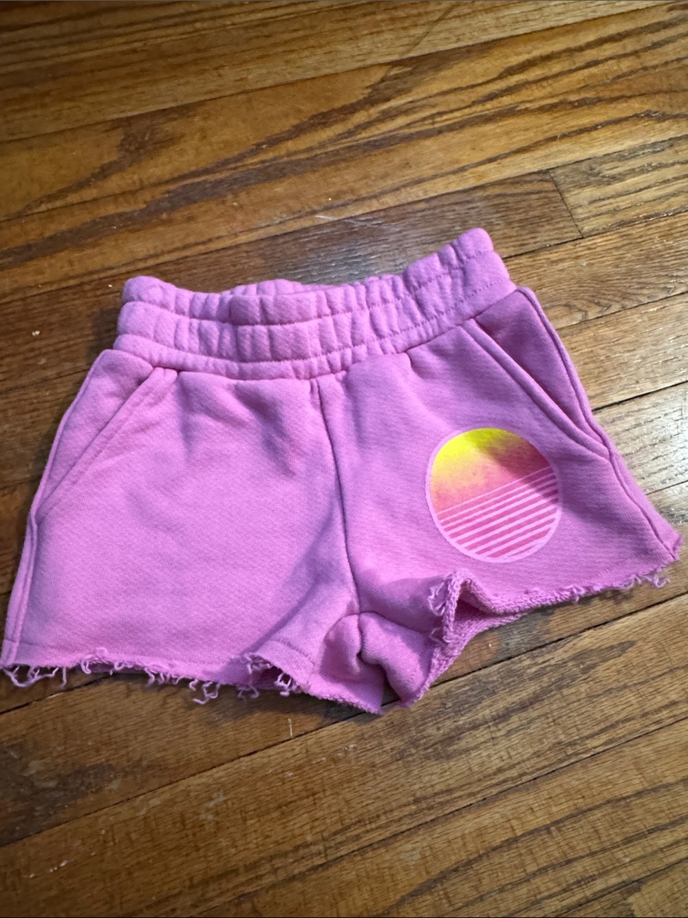 Chaser Pink Girls' Frayed Hem Shorts with Yellow Sunset Graphic